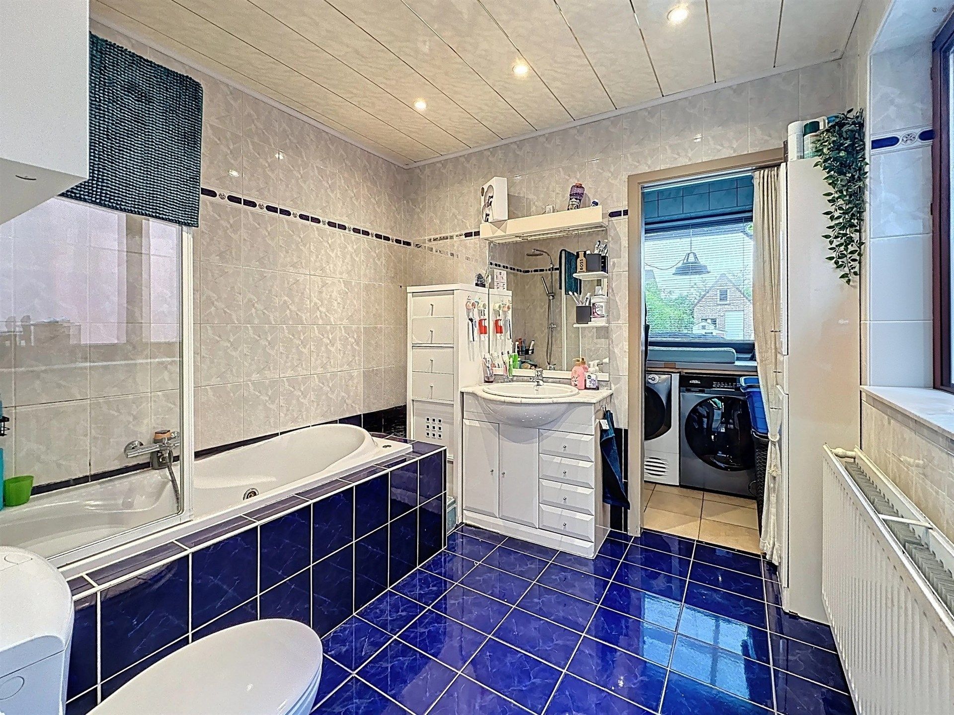 Instapklare woning met 3 slaapkamers en gezellige tuin op perceel van 310m². foto 10