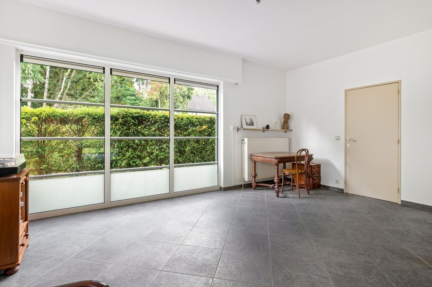 Prachtige halfopen woning met 3 slaapkamers en mooie tuin in Brasschaat! foto 9