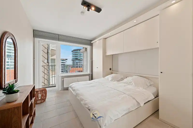 Smaakvol ingericht 2-slaapkamerappartement met adembenemend frontaal zeezicht foto 16