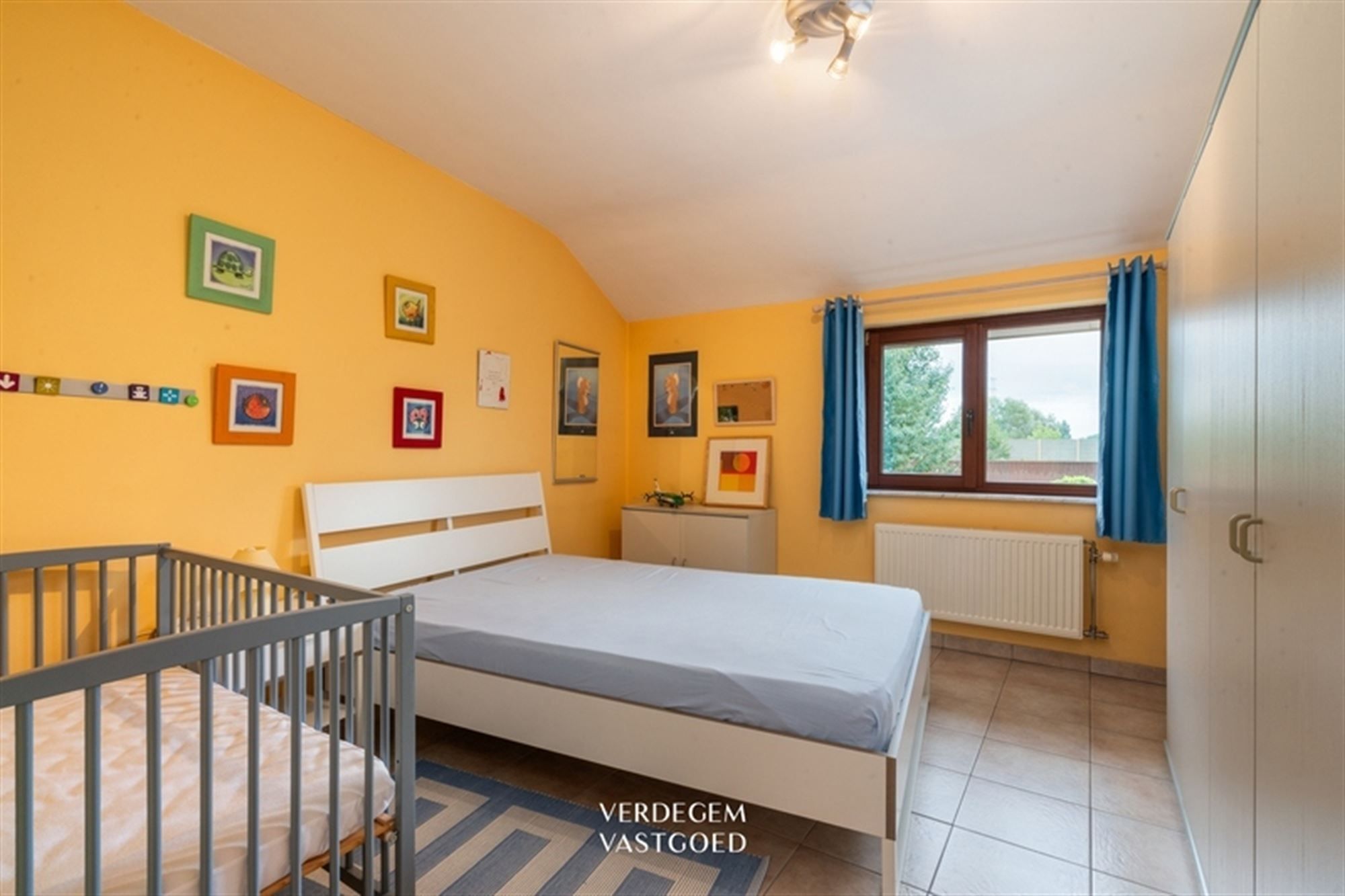 Instapklare woning met 3 slaapkamers, carport en fijne tuin foto 11