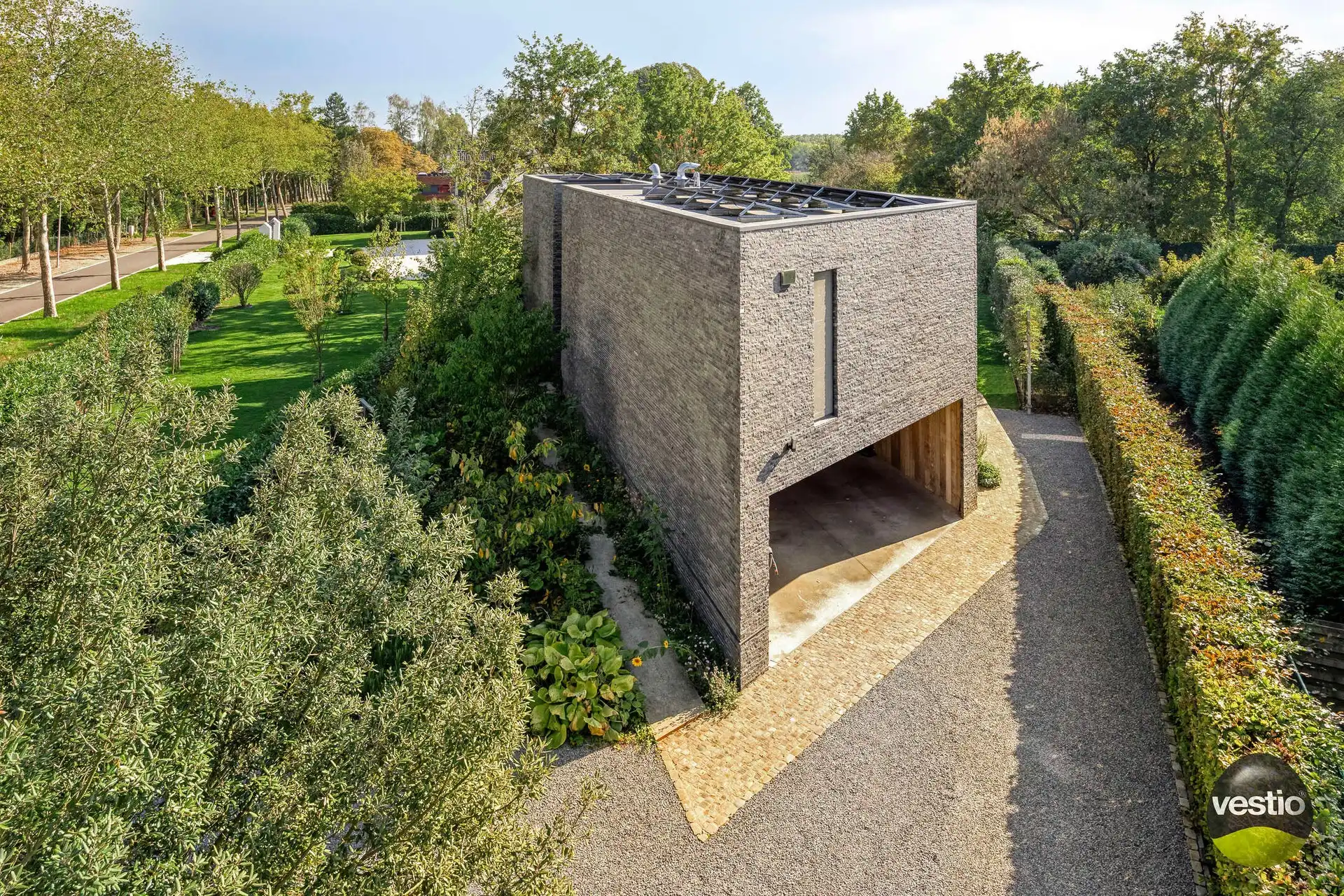 Moderne villa in de gegeerde Mombeekdreef – luxe, licht en rust op een toplocatie in Hasselt foto 2