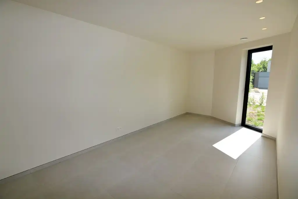 Gelijkvloers nieuwbouwappartement 124 m² met 2 slpk, tuintje en 2 autostandplaatsen. foto 14