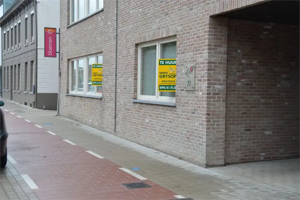 Ruim appartement met 2 slaapkamers, zonnig terras en garage in hartje Zwevezele / Hille foto 10
