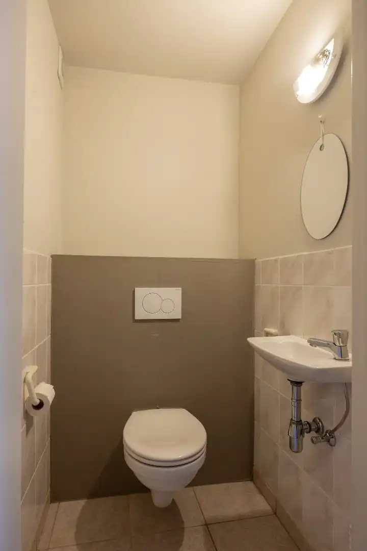 Ruim gelijkvloers appartement met terras en 2 slaapkamers te Overpelt centrum. foto 13