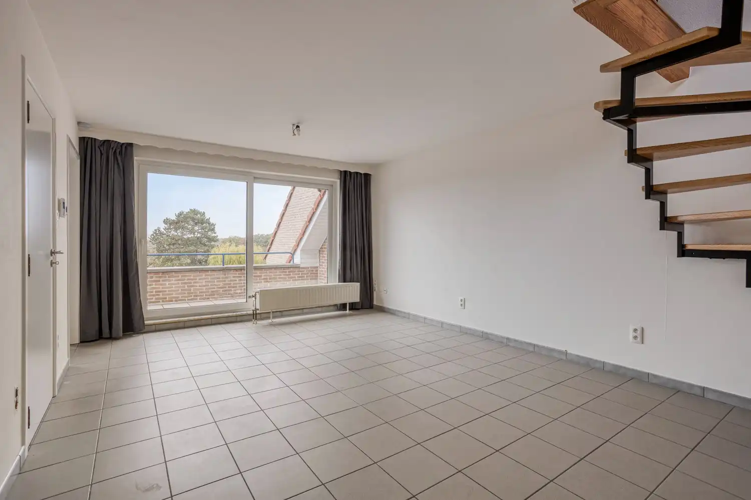 Ruime duplex met 3 slaapkamers  en garage te huur in het hart van Gellik, Lanaken foto 6