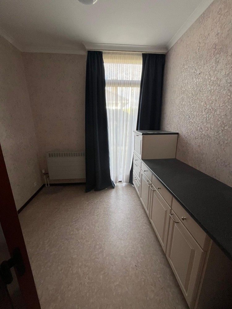 Gelijkvloerse woning met leuke stadstuin foto 10