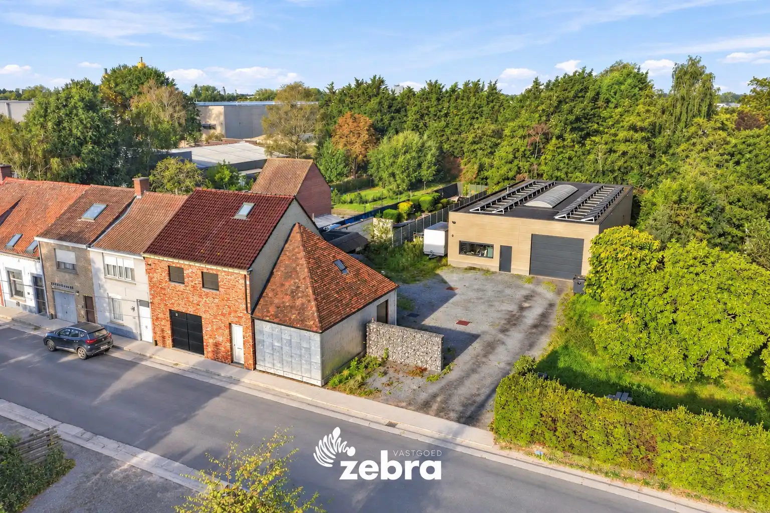 Halfopen bebouwing met loods (288 m²) te Rumbeke! foto {{pictureIndex}}