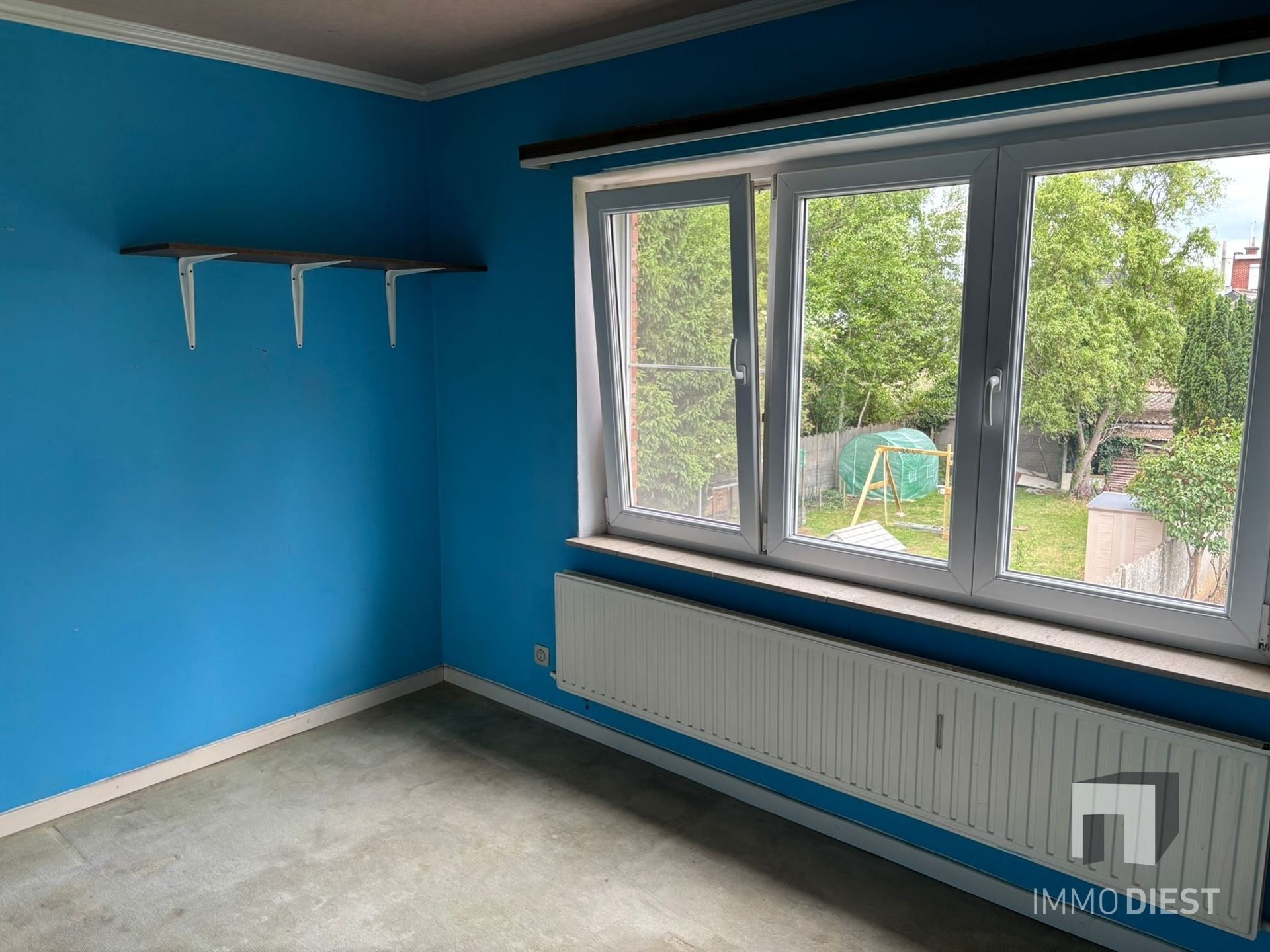 Leuke woning met tuin nabij het centrum - op te frissen foto 7