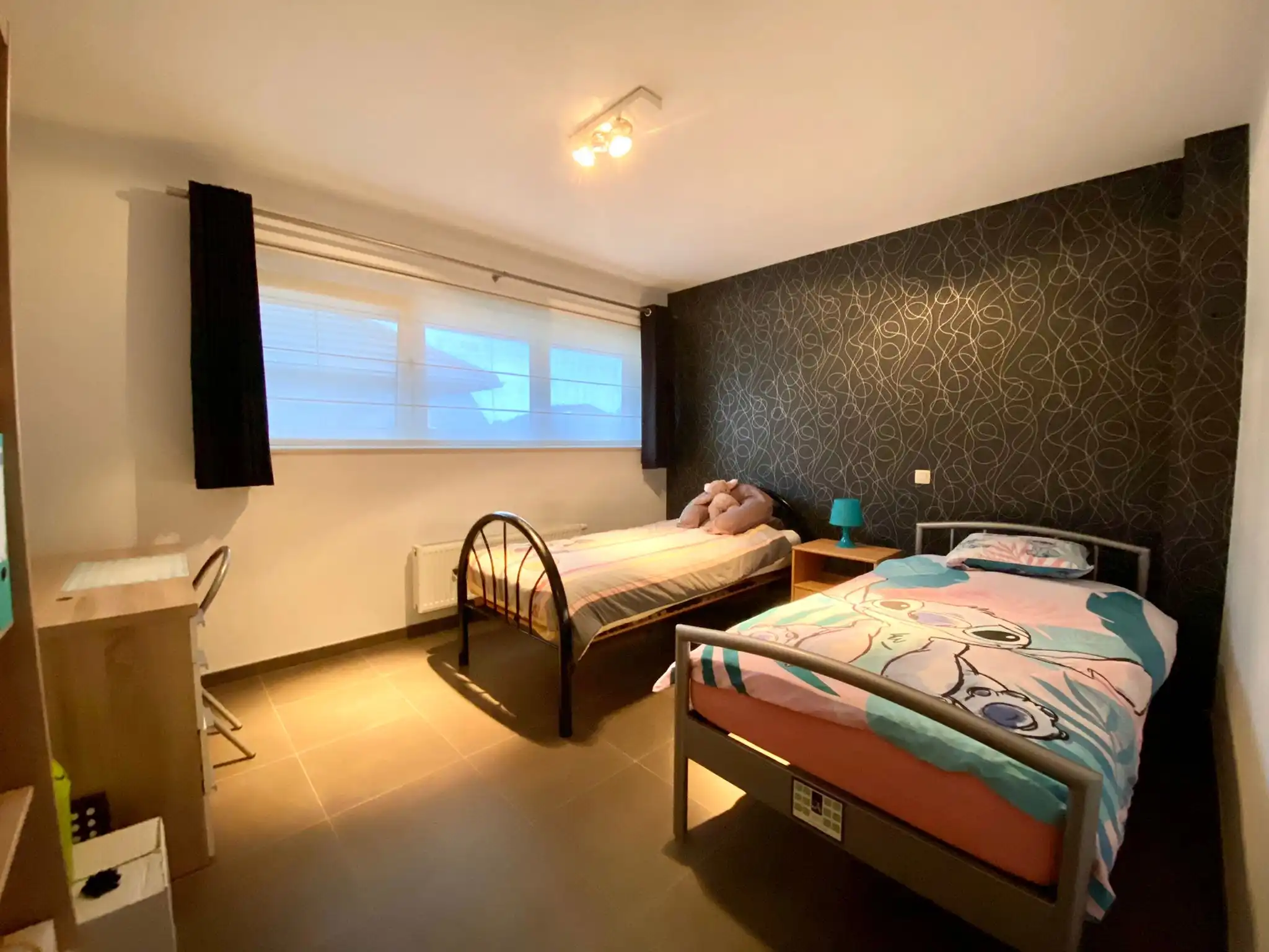 Centraal gelegen woning met drie slaapkamers, garage en tuin foto 7