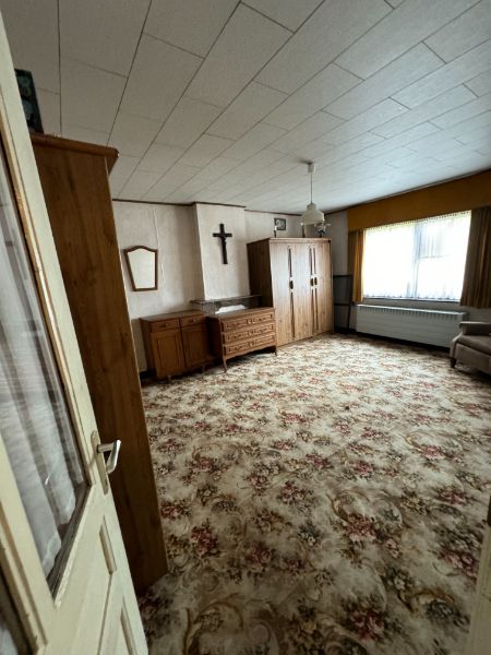 Te renoveren langgevelwoning met veel potentieel op ruim perceel in Herselt foto 15