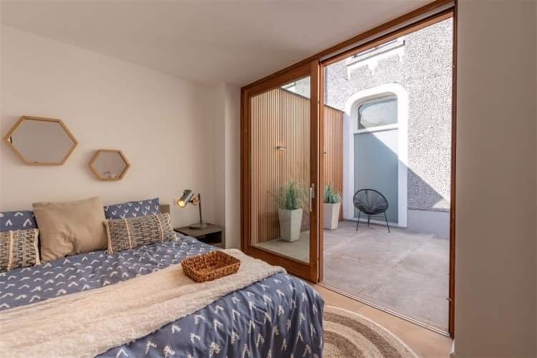 Karaktervol gelijkvloers  appartement met patio en terras foto 8
