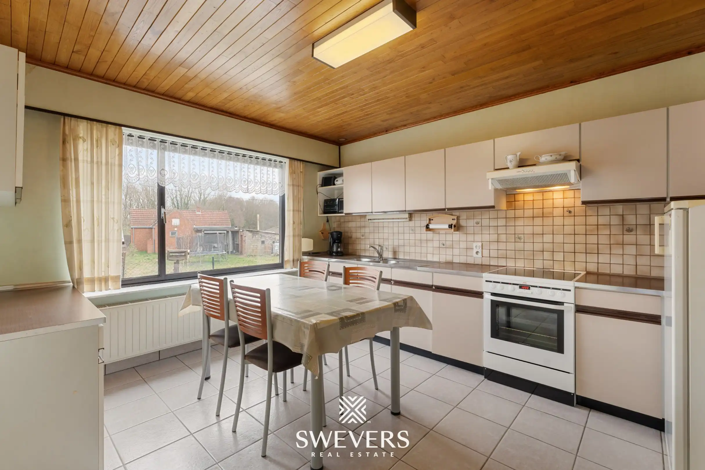 Charmante renovatiewoning met stevige structuur en veel potentieel in Koersel foto 9