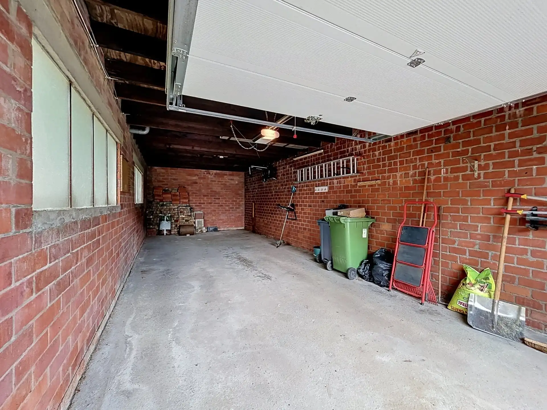 open bebouwing met 3 slaapkamers en garage op perceel van 1808m² foto 16