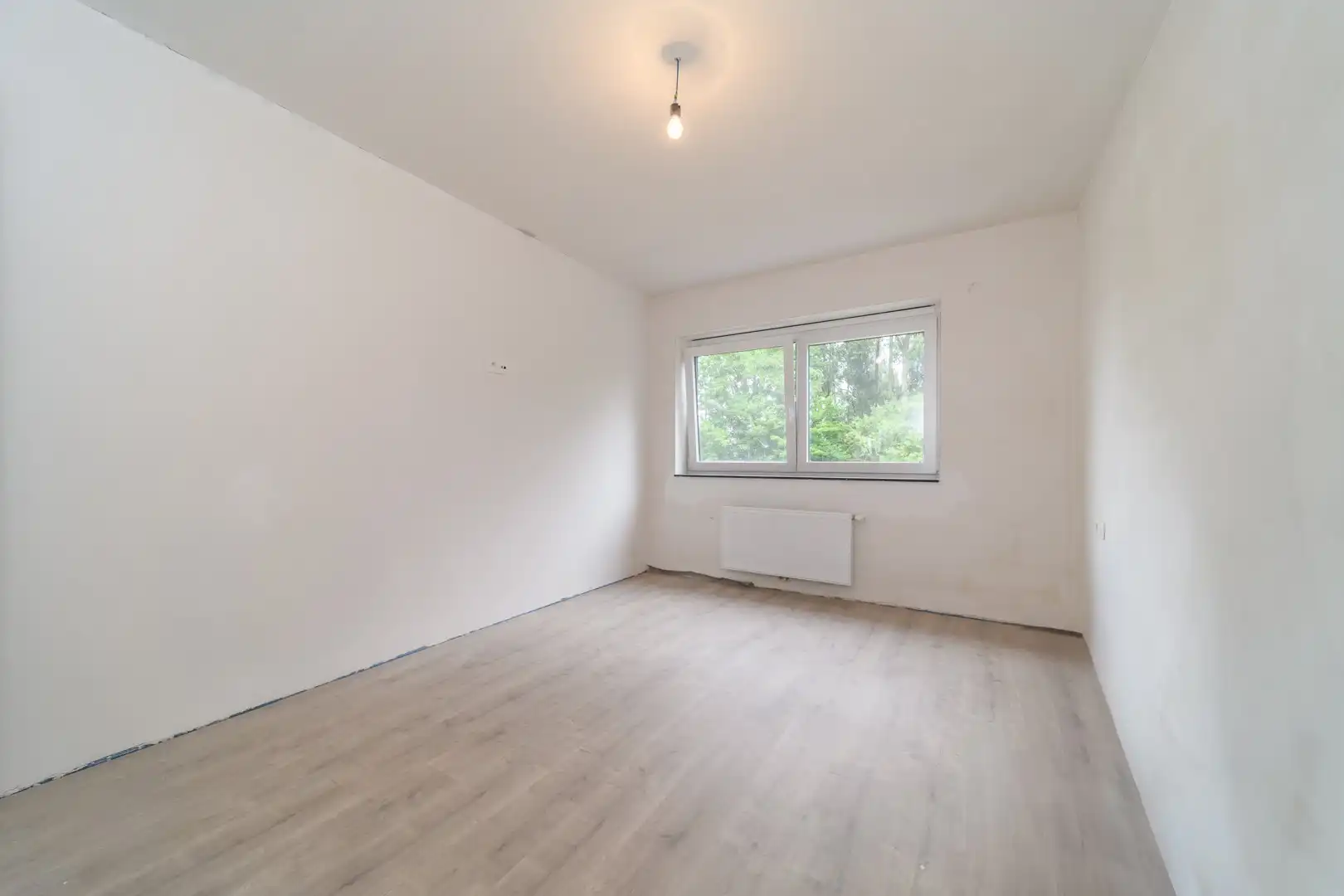 Gesloten bebouwing met tuin te Haaltert foto 14