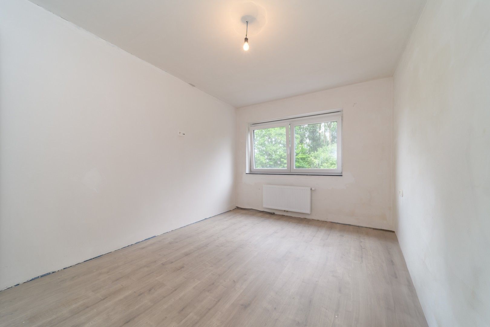 Gesloten bebouwing met tuin te Haaltert foto 14