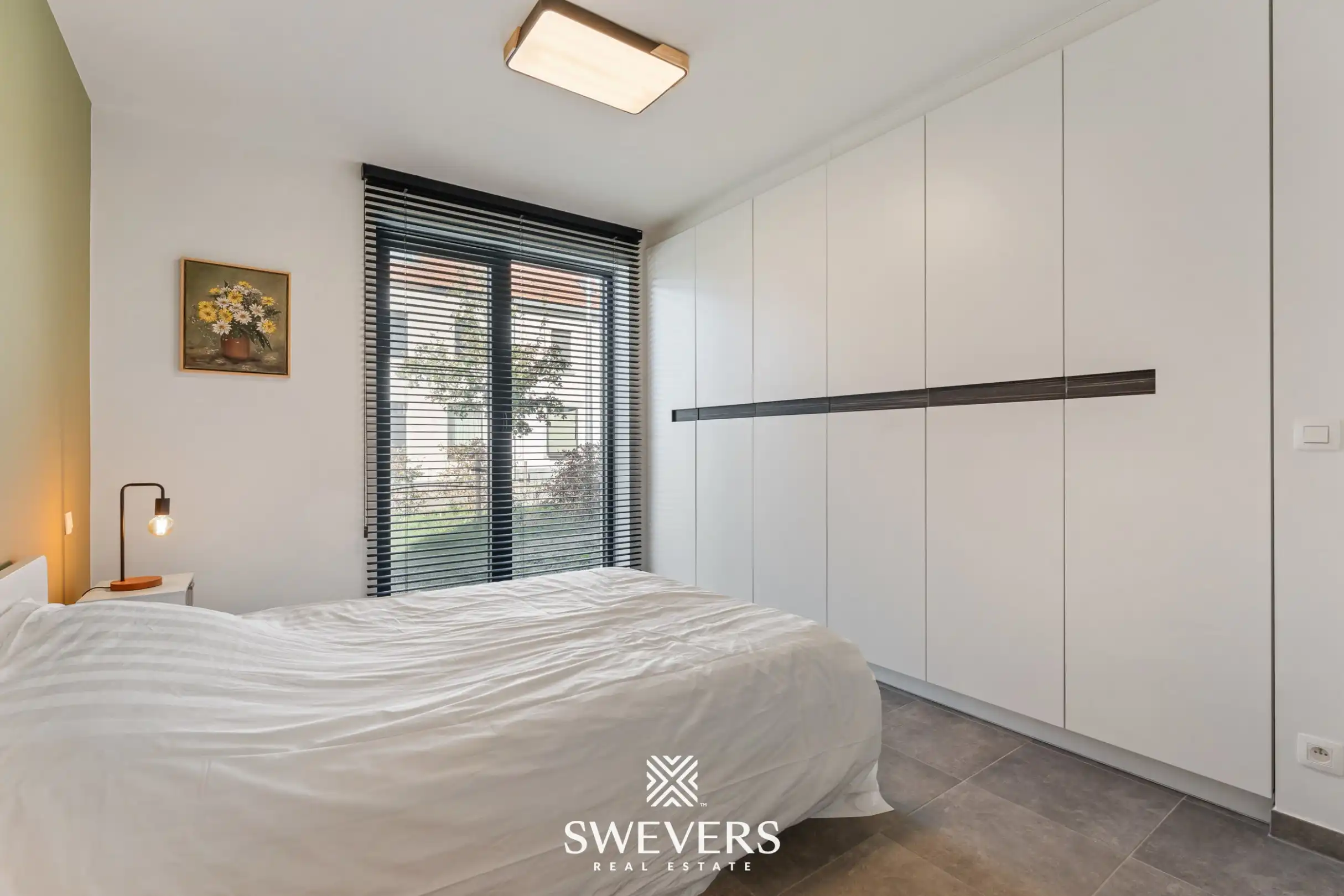 Recent & energiezuinig gelijkvloers appartement met Z-georiënteerde tuin in Wilsele foto 13