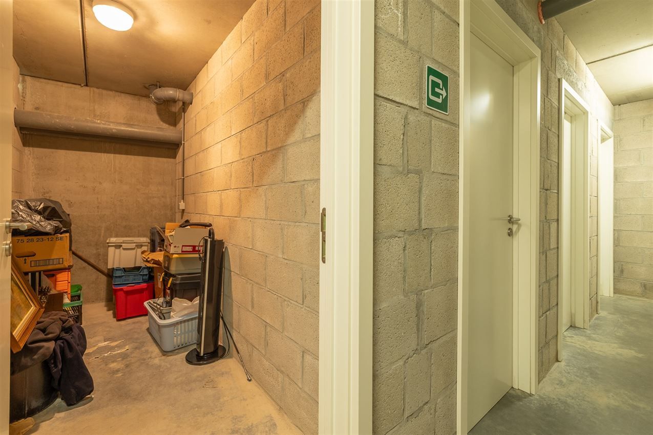 Gelijkvloers tweeslaapkamer appartement met terras en staanplaats in centrum  foto 24