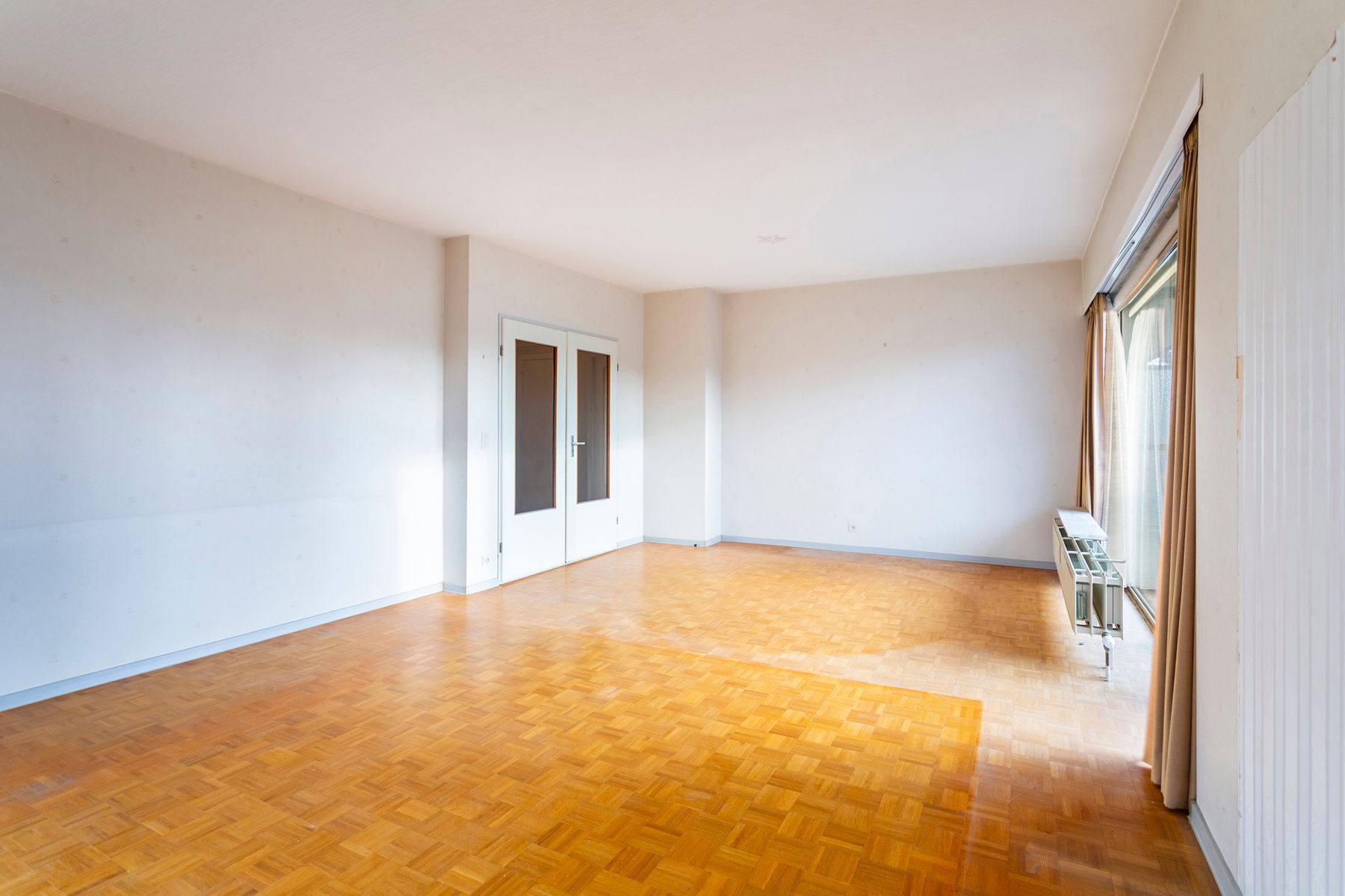 Lichtrijk appartement in het groen met renovatiepotentieel foto 5