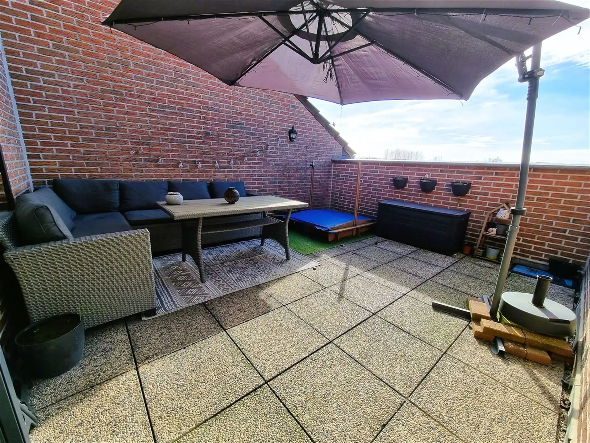 Zeer ruim dakapp 110m² met mooi zonnig terras, 2 slaapkamers en staanplaats achteraan foto 4