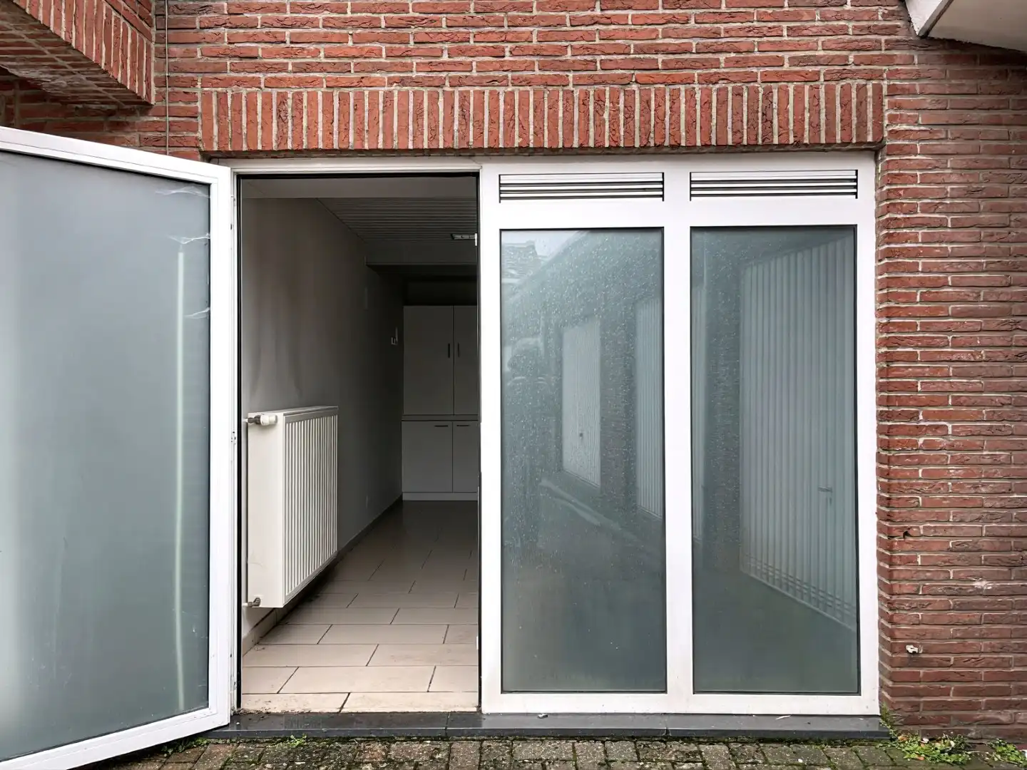 Veelzijdig pand op topligging: wonen en werken of tweewoonst met terrassen en garage foto 20