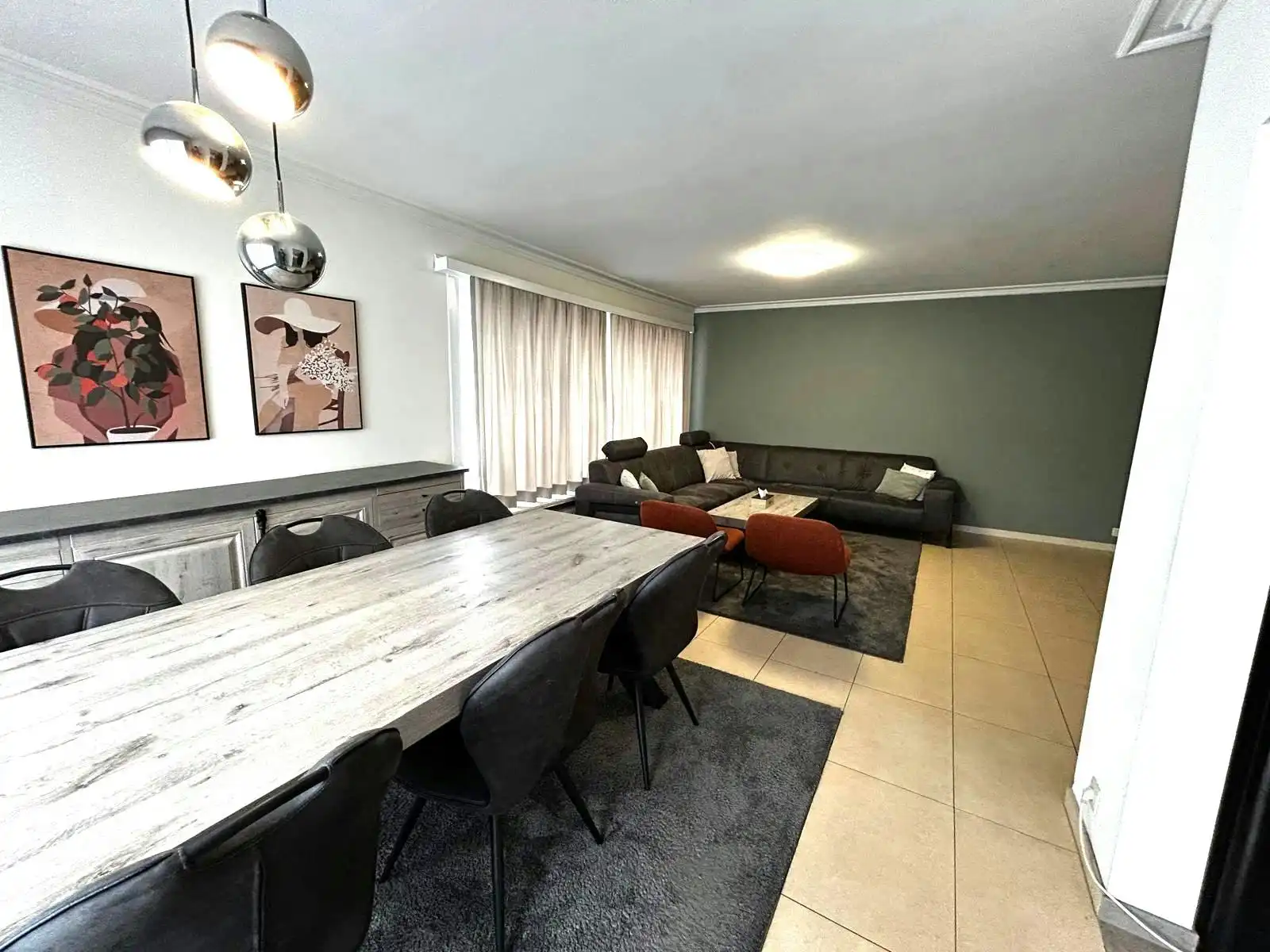 Building met twee verhuurde appartementen en 4 garages foto 4