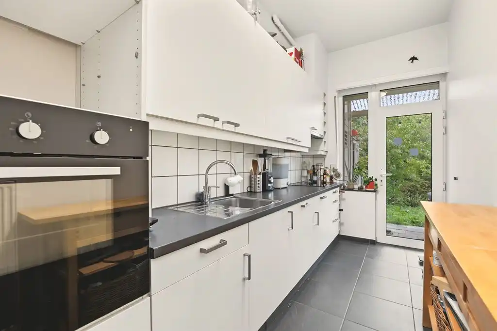 Gelijkvloers appartement met giga tuin foto 6