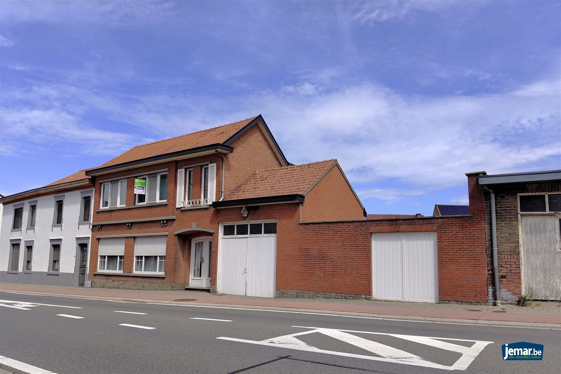 Hoofdfoto van de publicatie: Goed onderhouden woning met 3 slpk. en 2 ingangen in Mopertingen