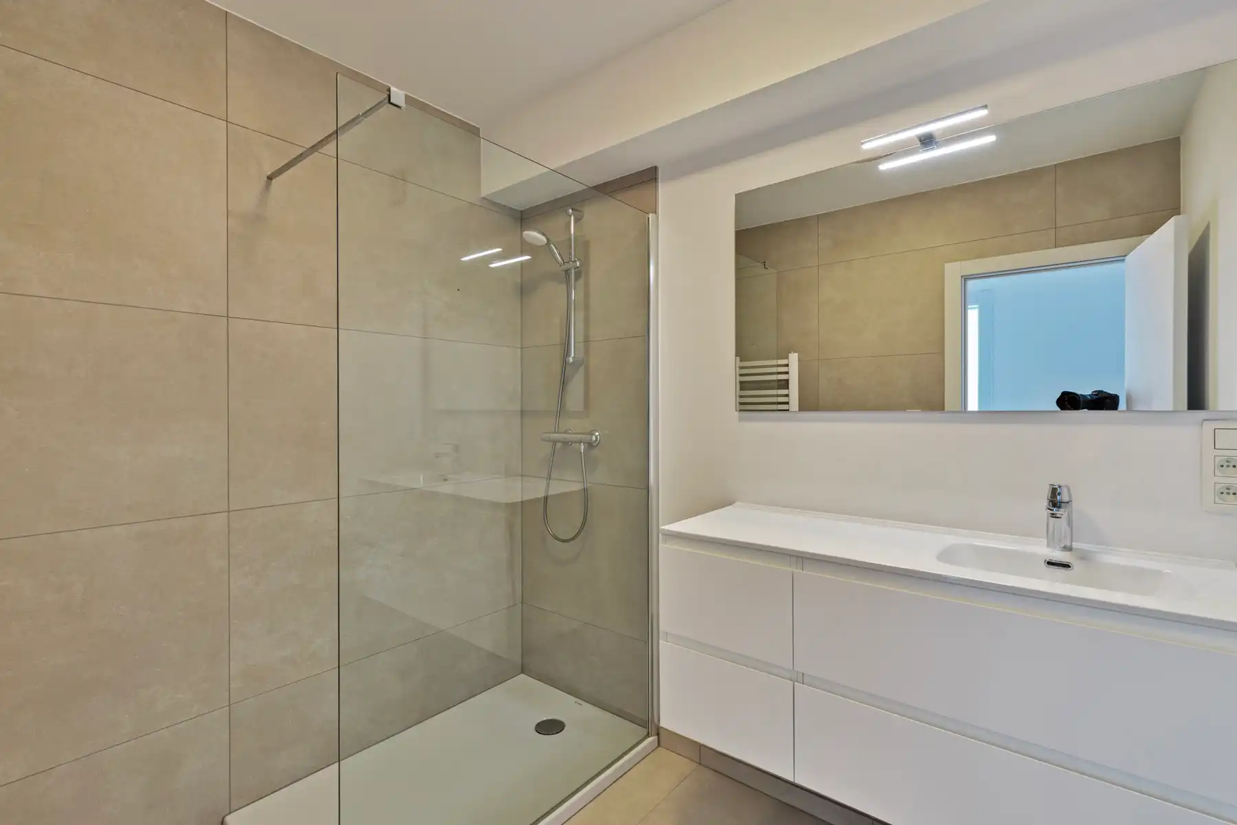 Duplex appartement met 4 slpk en 2 badkamers, tuin en garage foto 10