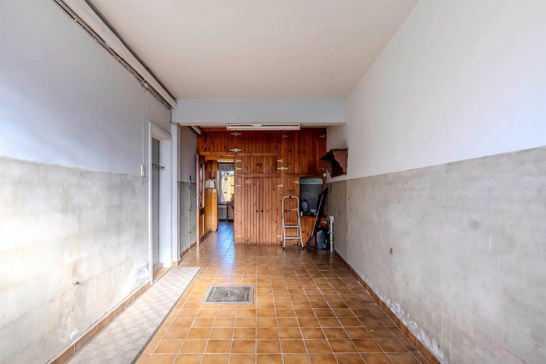 Te renoveren woning met 3 slpk, inpandige garage en tuin foto 14