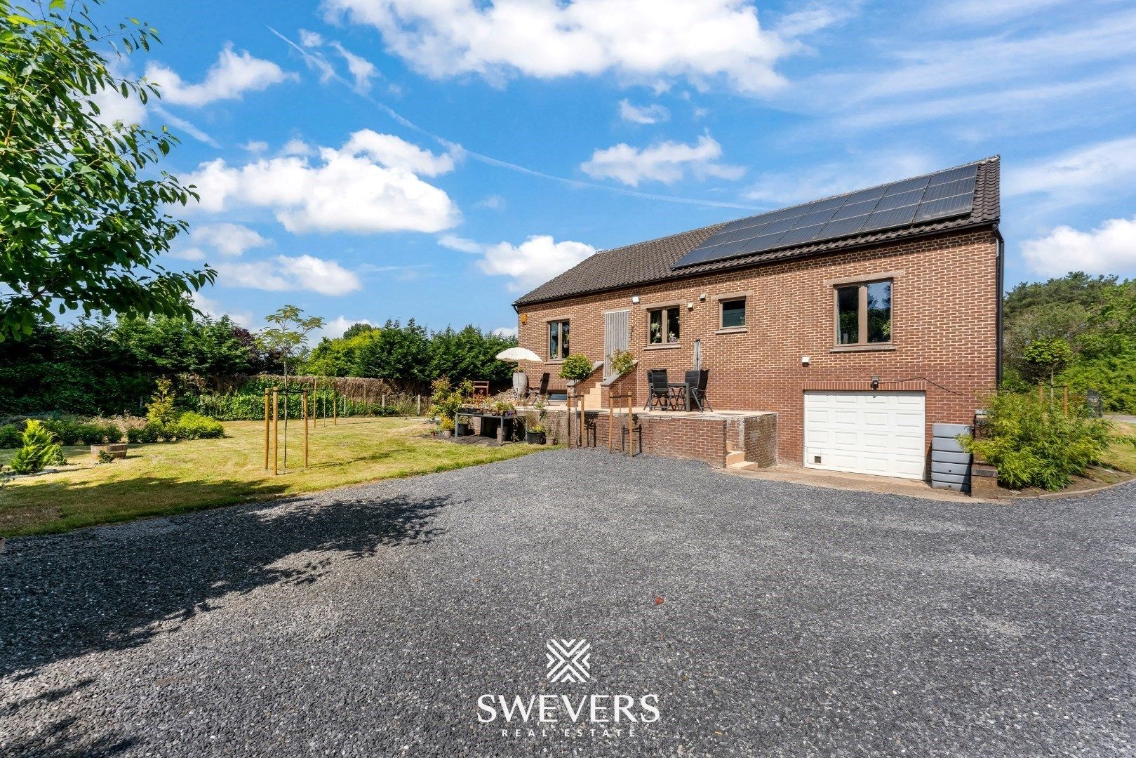 Ruime gezinswoning met zonnepanelen, kelder en zonnige tuin op topligging foto 30