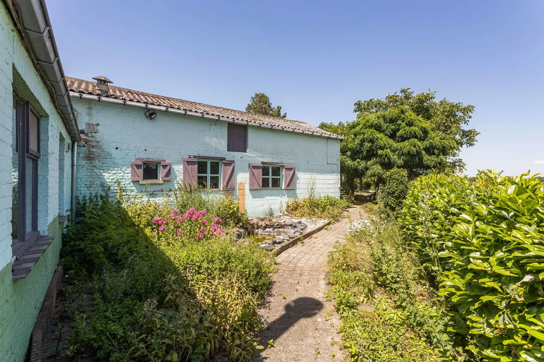 Te renoveren woning met grote tuin en atelier op toplocatie! foto 34