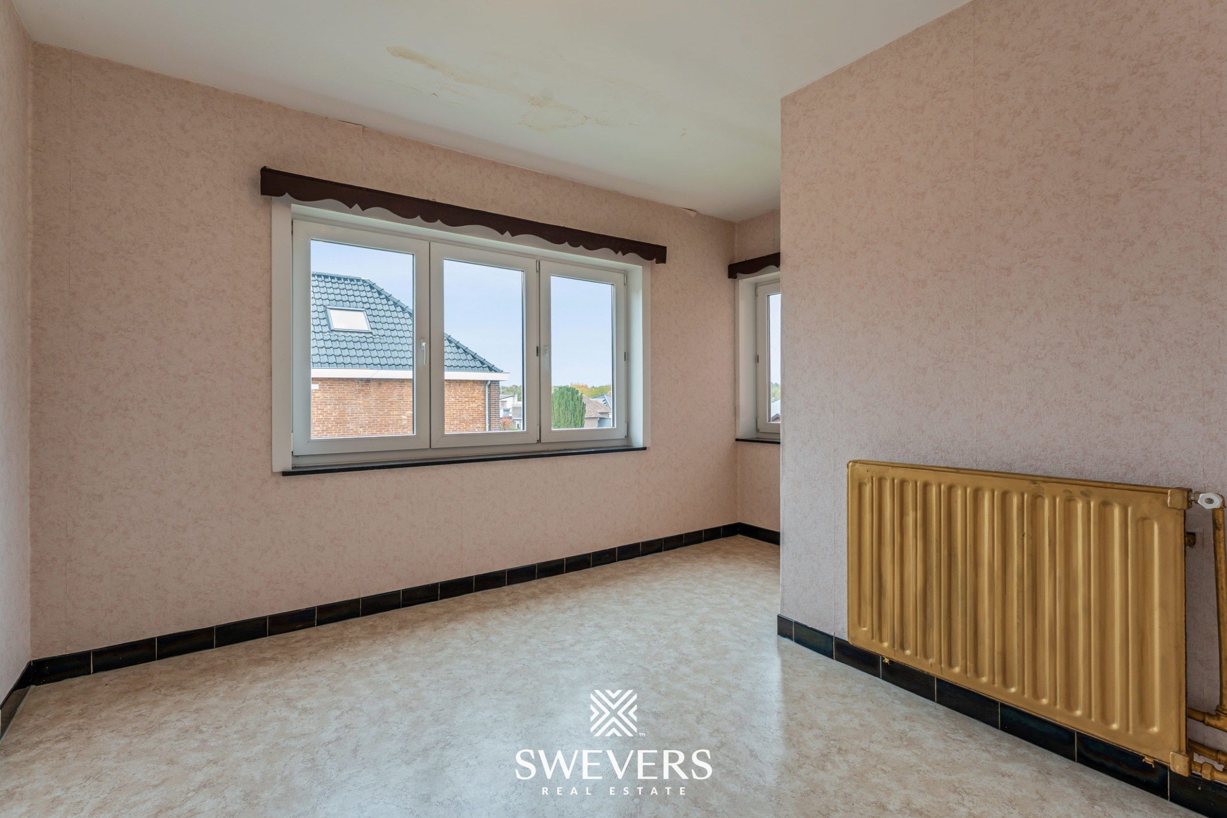 Ruime open bebouwing met potentieel en zuidgerichte tuin in rustige wijk van Houthalen foto 17