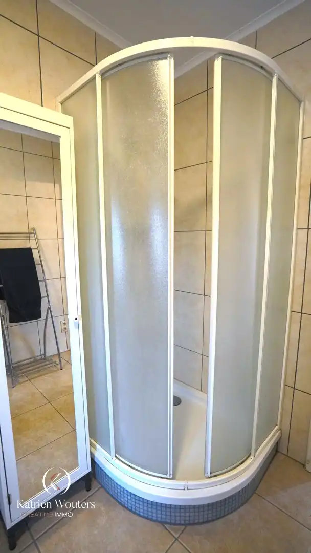 Gunstig gelegen gerenoveerde gezinswoning met tuin foto 15