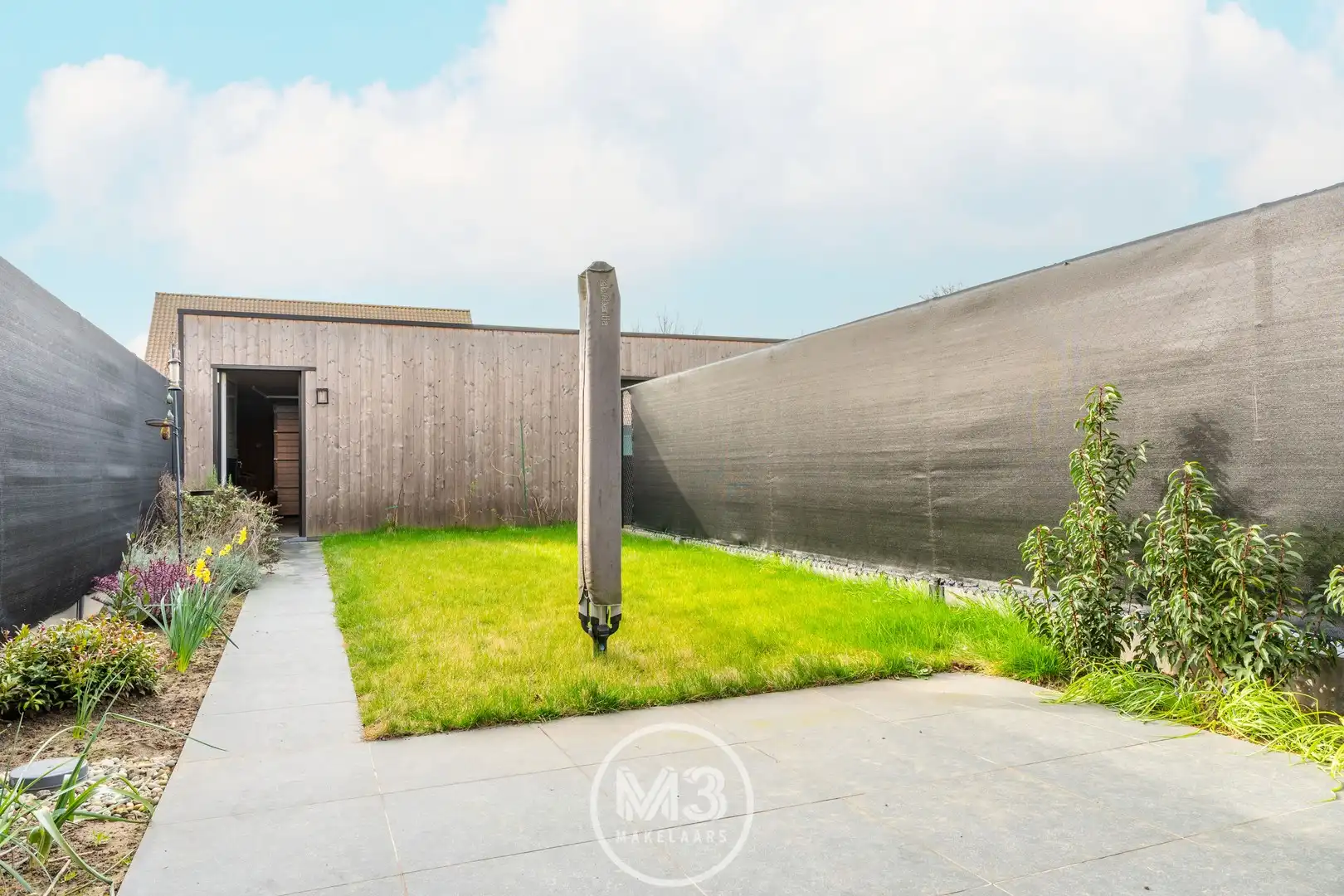 Gelijkvloers appartement met tuin en garage foto 16