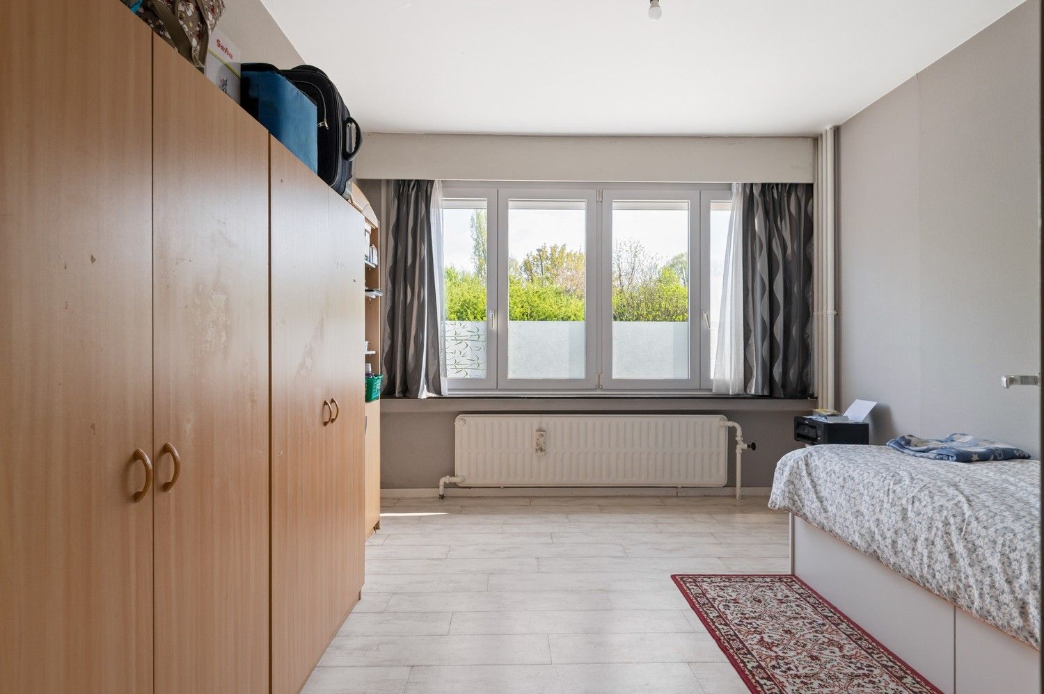 Gelijkvloers appartement met 2 ruime slaapkamers en tuin! foto 11