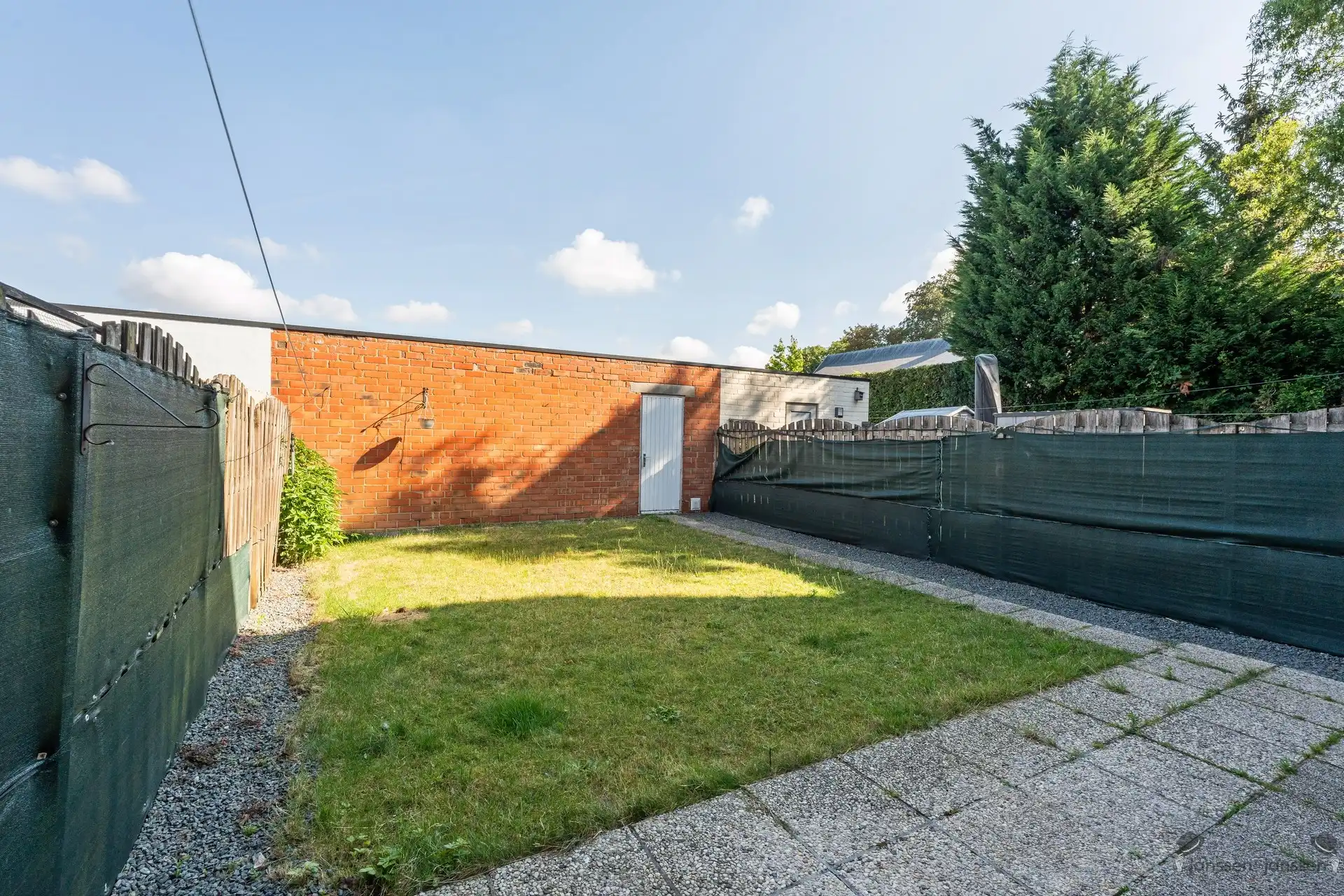 Op te frissen gelijkvloersappartement met 3 slpk's, tuin en garage foto 15