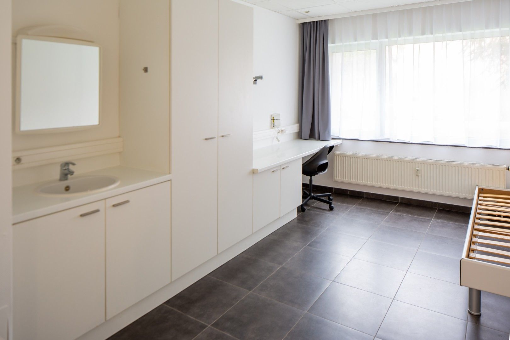 Studentenbuilding (gelijkvloers) met rendement van 5%, conformiteitsattest en verhuurgarantie foto 9