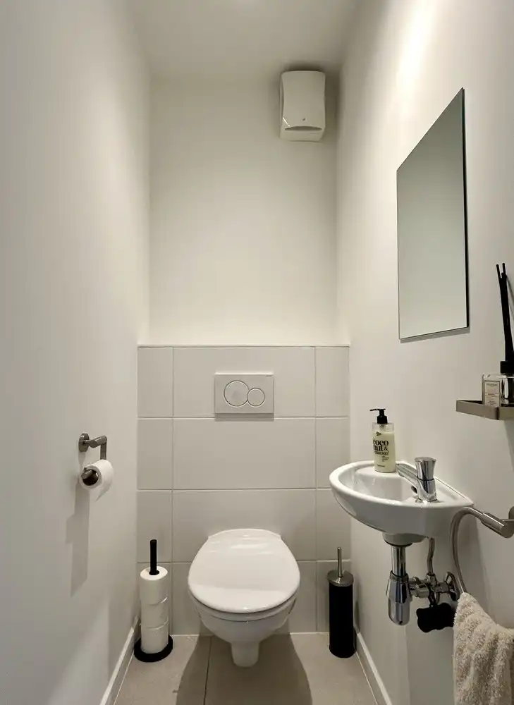 Instapklaar gelijkvloers appartement met privatieve tuin en garage in hartje Kessel-Lo foto 14