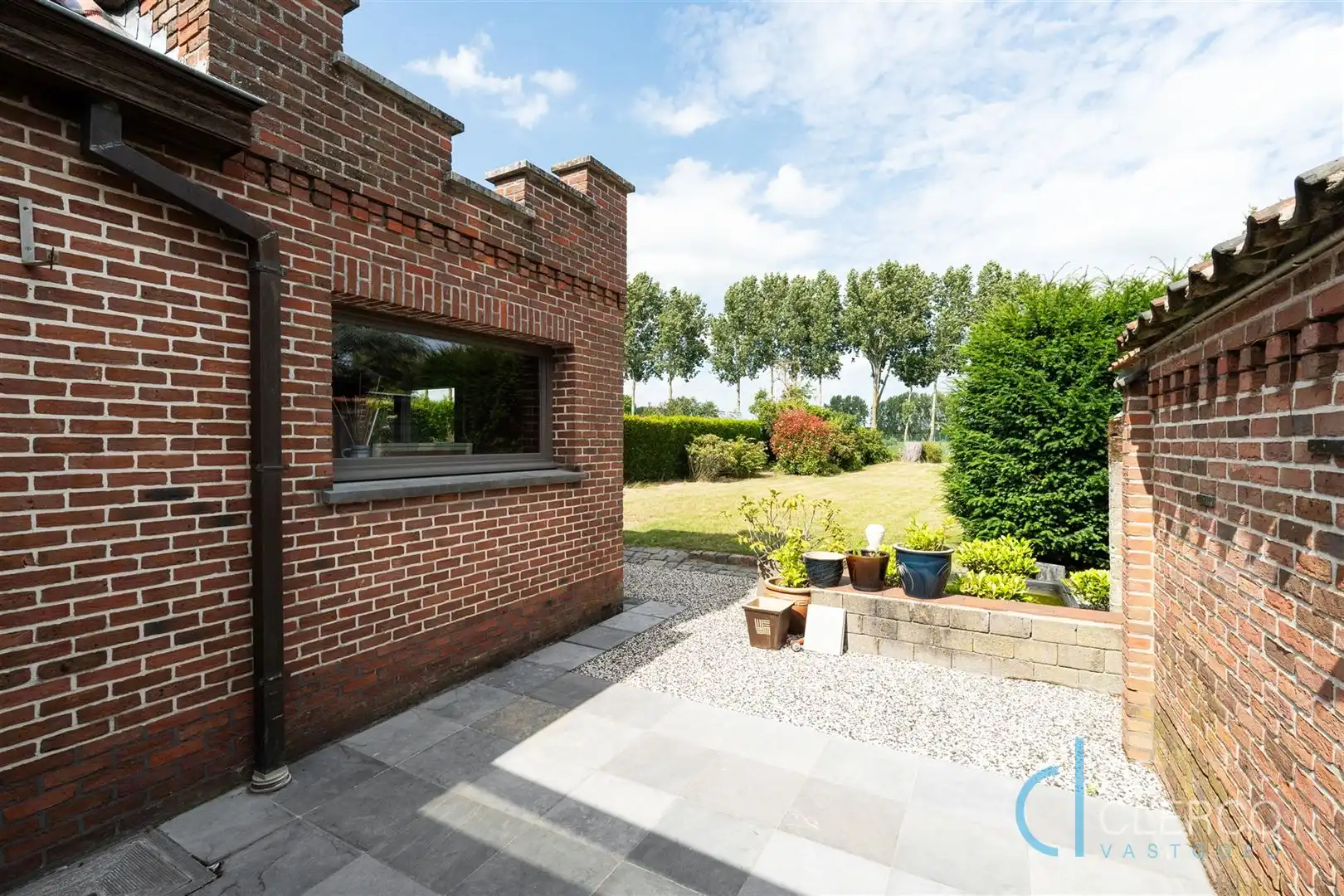 Woning met goed onderhouden tuin te koop in groot Lochristi! foto 13