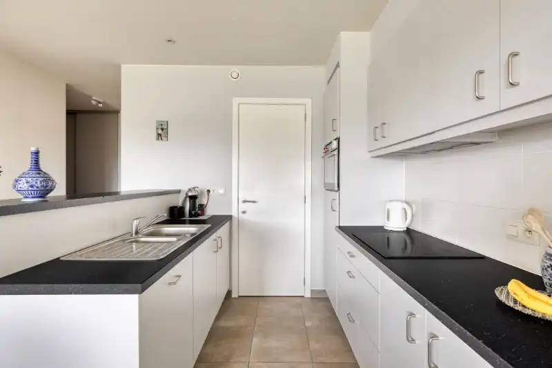 Prachtig appartement te koop in Gent met 2 slaapkamers, garage en uitstekende ligging aan de Staakskenstraat. foto 5