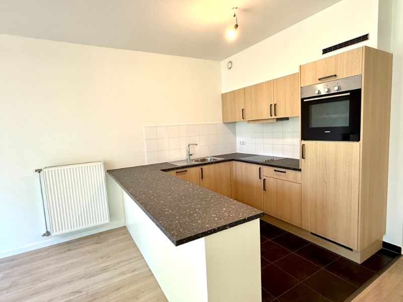 Centraal gelegen, gelijkvloers appartement met 2 slaapkamers en ruim terras met zicht op de Leie foto 10