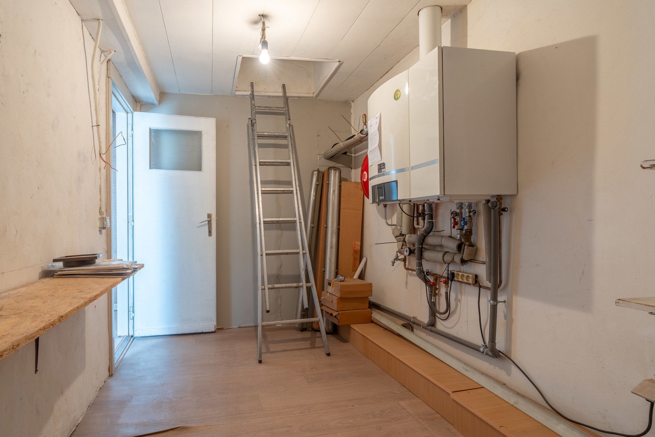 Te renoveren woning met toffe tuin en garage in het centrum foto 32