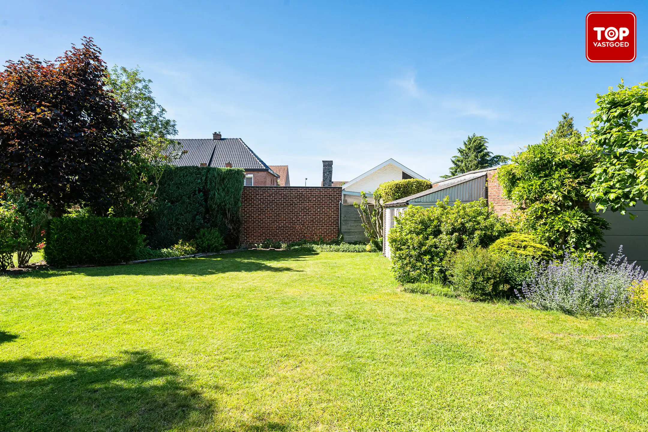 Architecturale woning met unieke split-level indeling met naastgelegen stuk grond. (totaal 997m²) foto 28