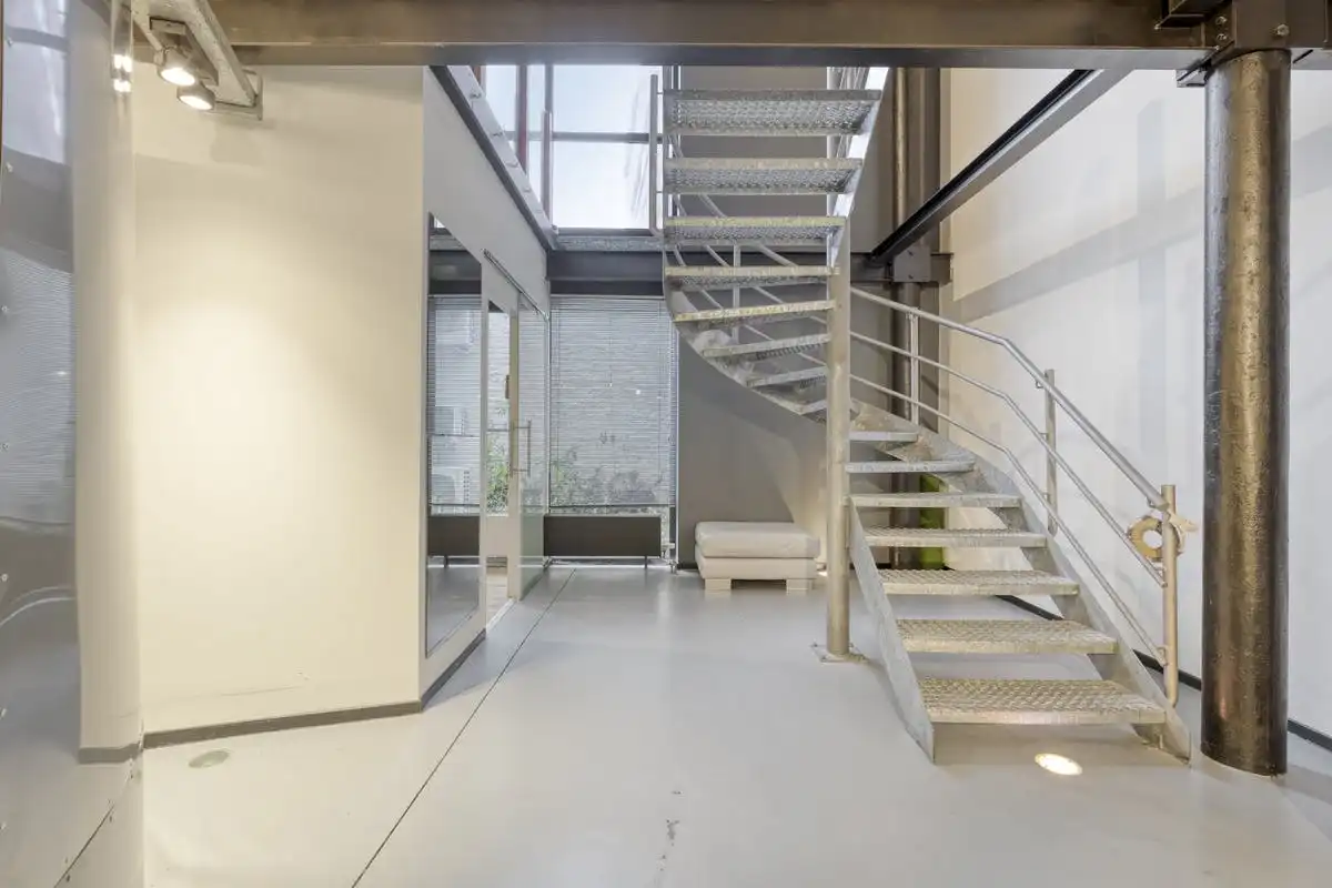 Industriële duplexloft met karakter in Gent foto 11