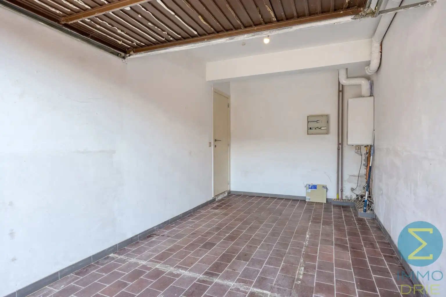 Opbrengsteigendom met 3 verhuurde appartementen en garages foto 14