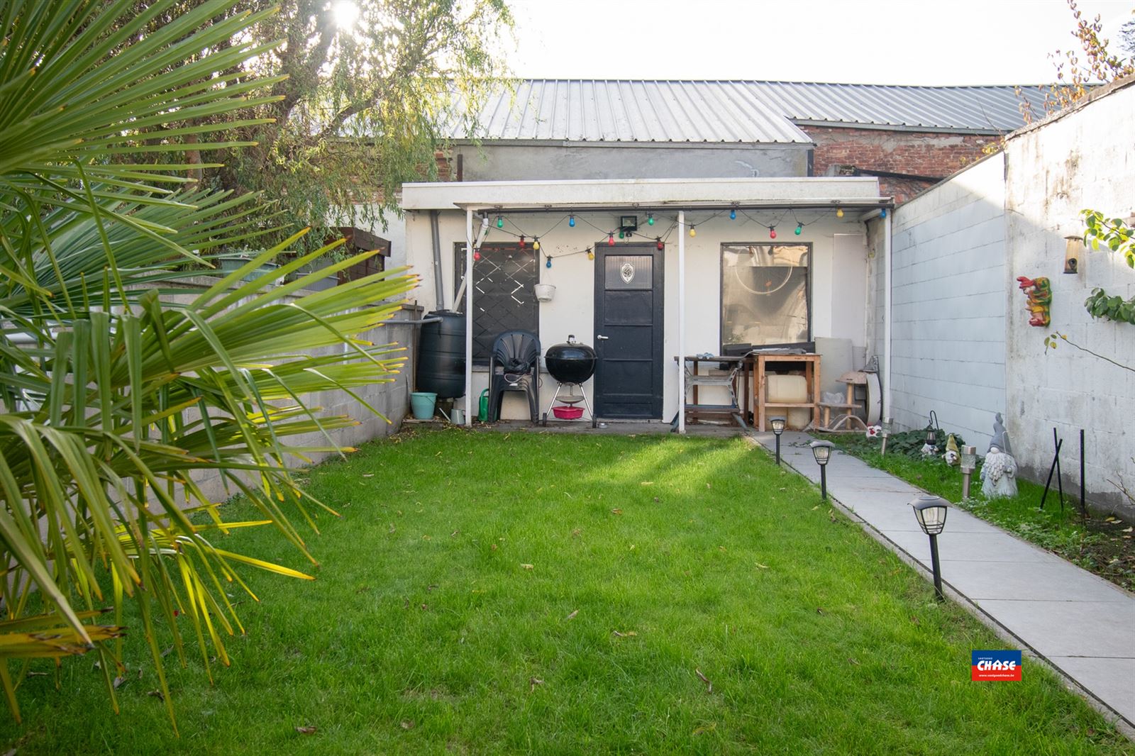 Rijwoning met drie slaapkamers en tuin foto 10