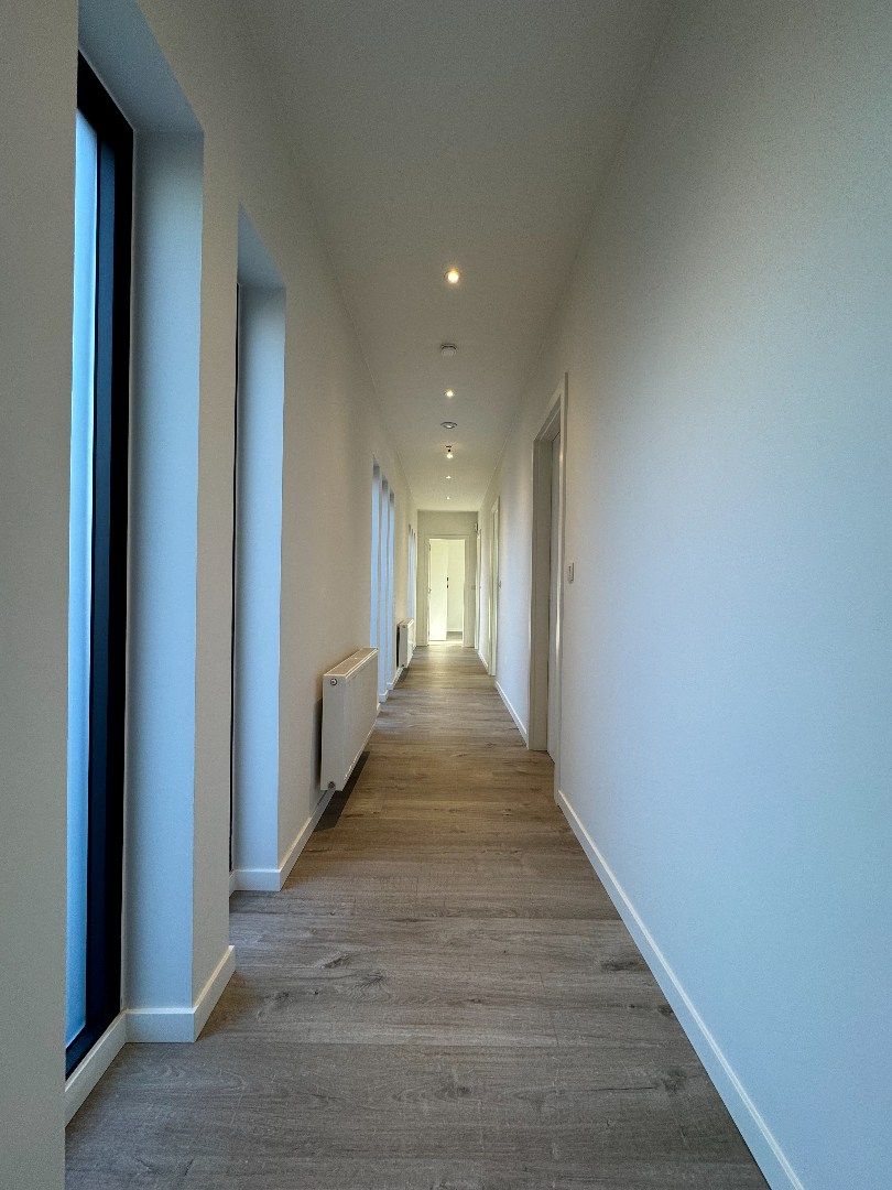 een instapklare 4-gevelwoning met tuin foto 6