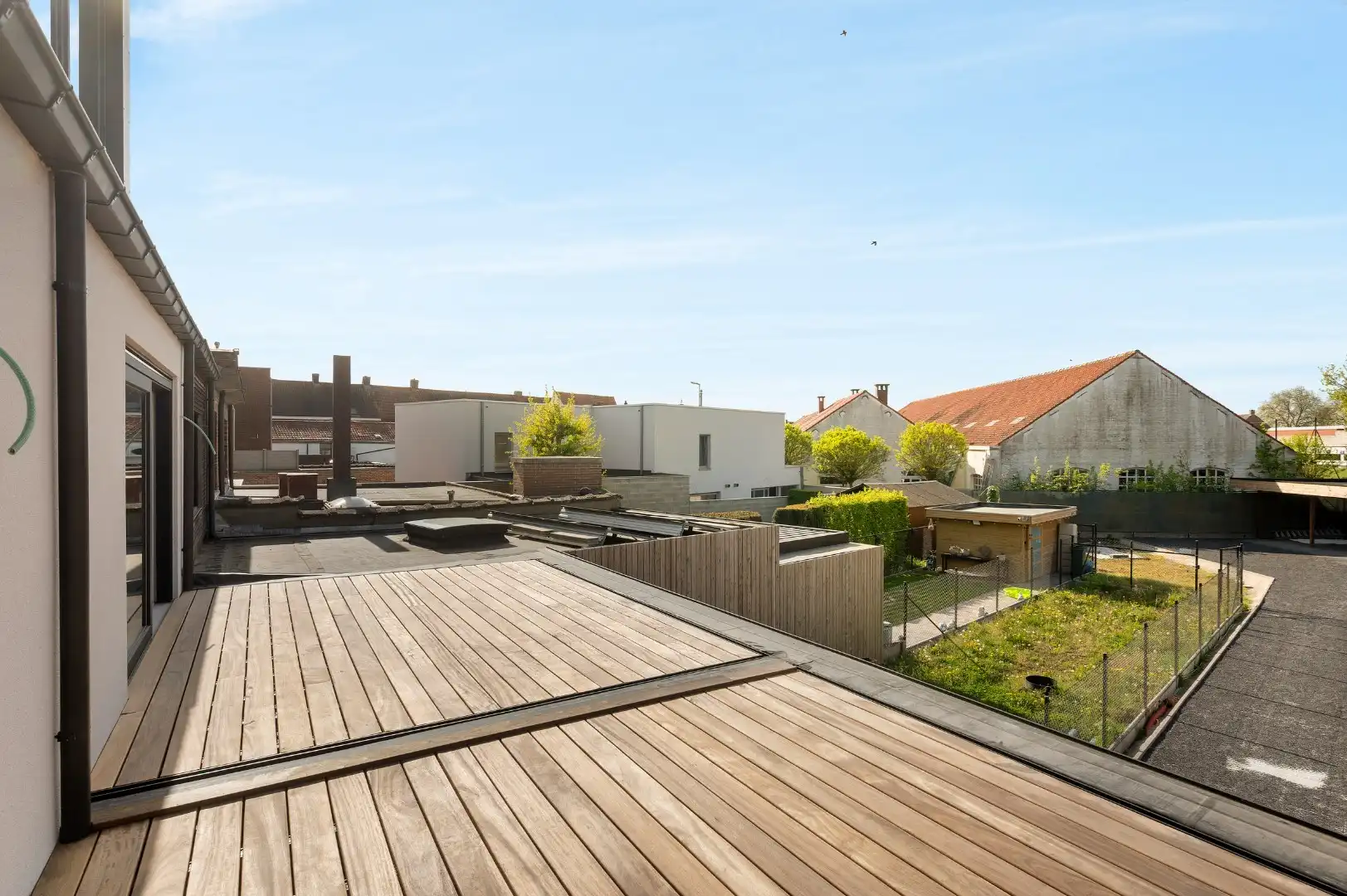 DUPLEX NIEUWBOUWAPPARTEMENT MET 2 SLPKS EN RUIM TERRAS TE GELUWE foto 11