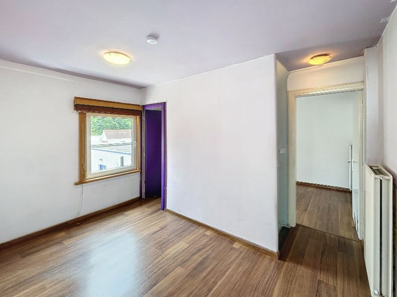 Halfopen woning met magazijn foto 16