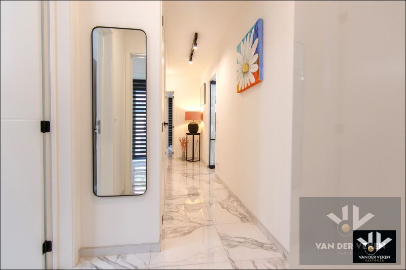 Hoogwaardig afgewerkt, rustig en centraal gelegen nieuwbouwappartement met 2 terrassen en garage in het gezellige Kortessem foto 13